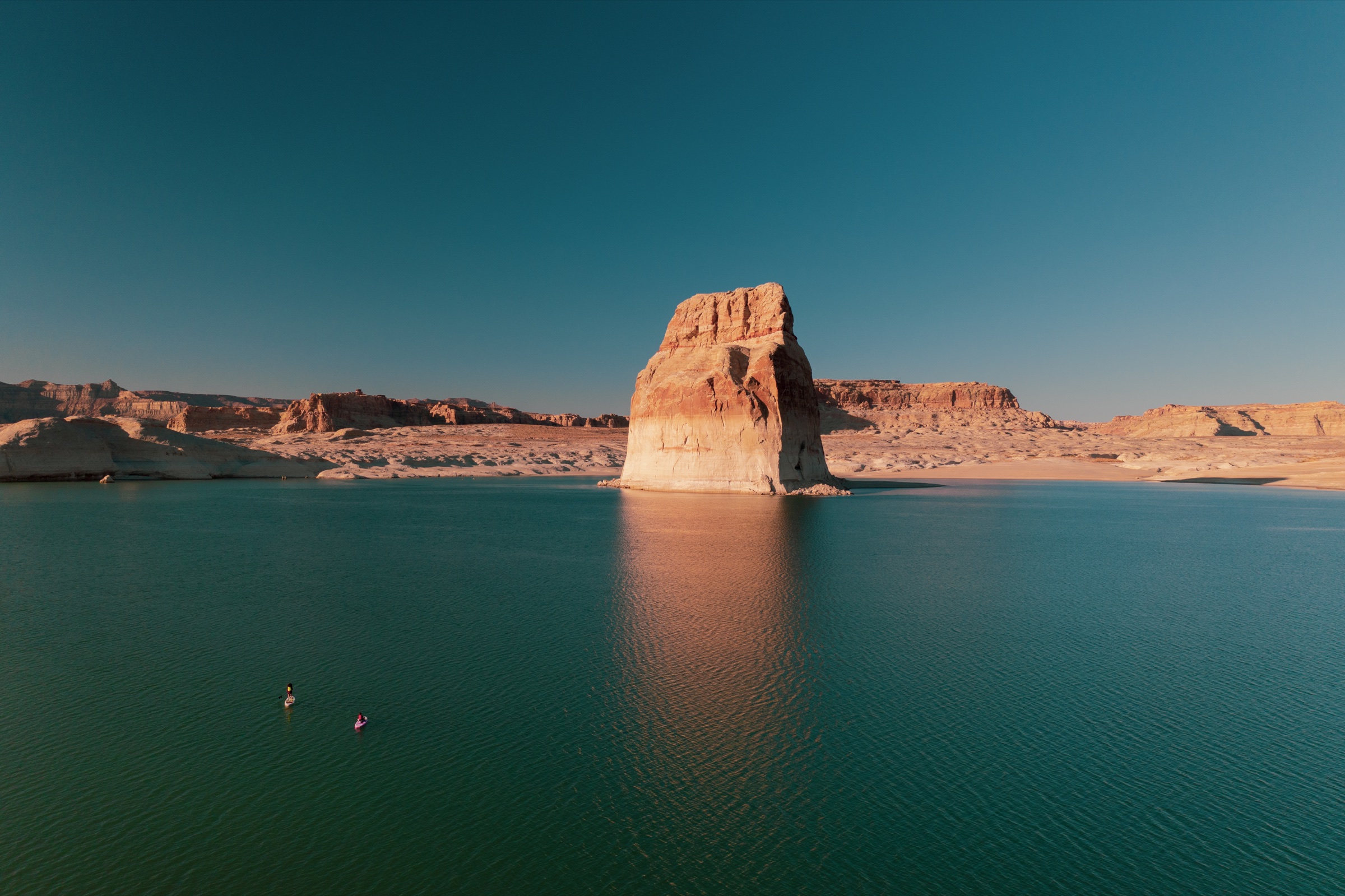 Lone Rock and paddlers on Lake Powell